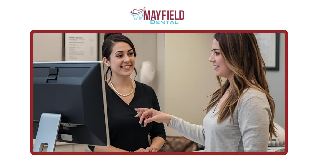Mayfield Dental Clinic staff explaining wisdom teeth removal cost and CDCP coverage